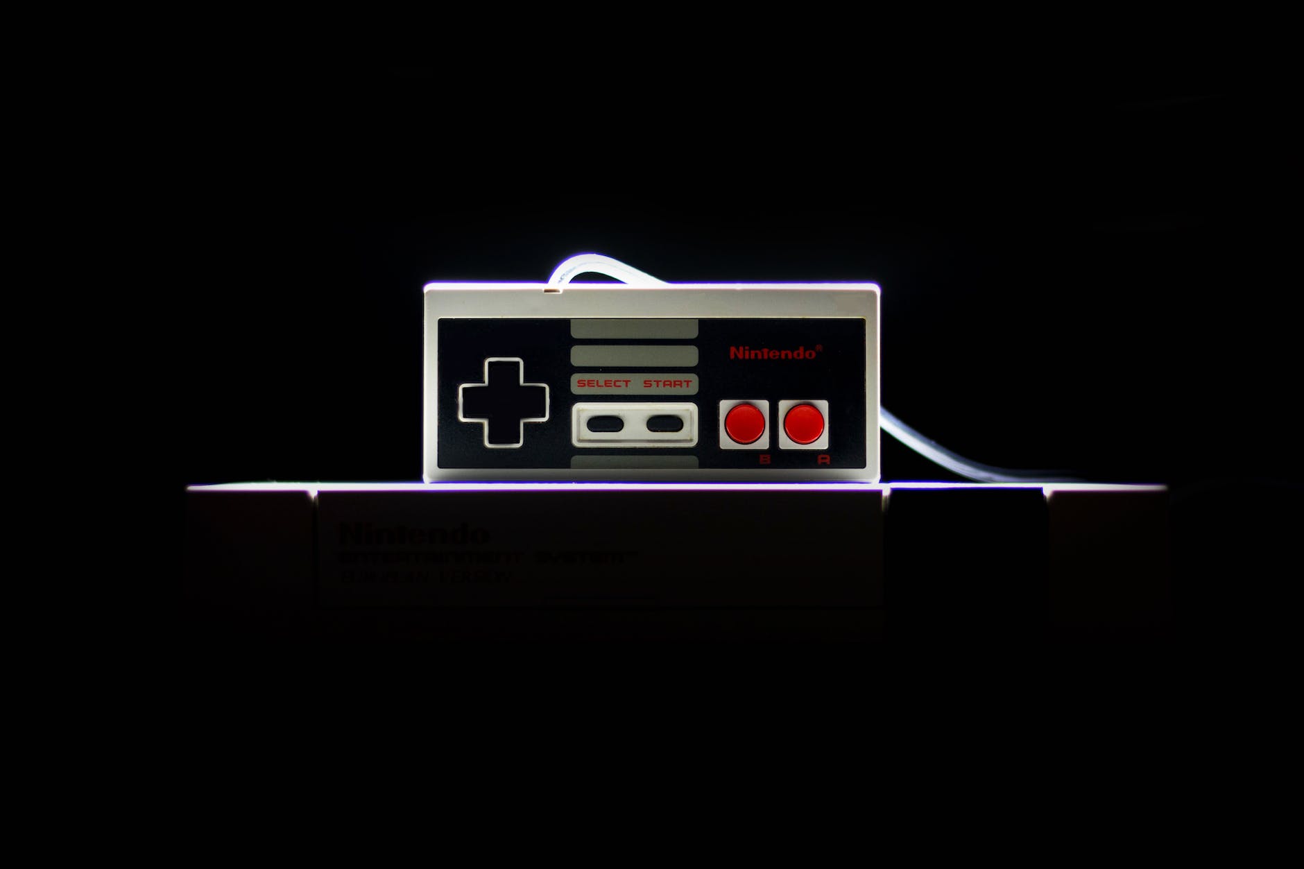 low light photo of nes controller